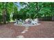 Relaxing backyard area with a cozy fire pit and plenty of seating at 101 Ironcreek Pl, Apex, NC 27539