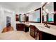 Bathroom featuring dual vanities, a makeup area, and tile flooring providing a modern touch at 101 Ironcreek Pl, Apex, NC 27539