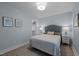 Charming bedroom with walk-in closet, complemented by soft colors and two side lamps at 1015 Watts St, Durham, NC 27701
