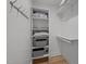 Organized closet space with shelving for storage and hanging clothes at 1015 Watts St, Durham, NC 27701