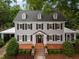 Classic exterior view, featuring a well-manicured lawn and a welcoming entrance at 1015 Watts St, Durham, NC 27701