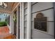 Charming historic home's exterior with a preservation plaque and an inviting front entrance at 1015 Watts St, Durham, NC 27701