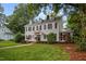 Beautiful home featuring a landscaped yard and a classic, elegant exterior design at 1015 Watts St, Durham, NC 27701