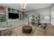 Bright living room with built-in shelving, comfortable seating, and an open floor plan at 1015 Watts St, Durham, NC 27701