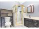 Bathroom featuring a shower, toilet, and a vanity sink at 105 Houston Cir, Cary, NC 27513