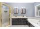 Bathroom featuring a shower, bath tub, and a double sink vanity at 105 Houston Cir, Cary, NC 27513