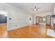 Spacious living room with hardwood floors and a ceiling fan at 105 Houston Cir, Cary, NC 27513