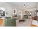 Bright living room showcasing a comfortable sofa and fireplace, perfect for gatherings at 105 Houston Cir, Cary, NC 27513