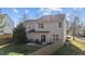 Backyard featuring a patio with outdoor furniture and a fenced yard at 105 Stoney Dr, Durham, NC 27703
