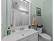 Bathroom featuring a single vanity with a framed landscape picture hanging above the toilet at 105 Stoney Dr, Durham, NC 27703
