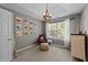 Bedroom with neutral decor, carpet flooring, and plenty of natural light at 105 Stoney Dr, Durham, NC 27703