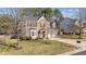 Lovely exterior view of a brick home with a two-car garage and well-maintained landscaping at 105 Stoney Dr, Durham, NC 27703