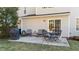 Concrete patio with outdoor furniture, grill, and sliding glass door at 105 Stoney Dr, Durham, NC 27703