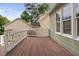 Large wooden deck perfect for outdoor entertaining with white railings at 10516 Cokesbury Ln, Raleigh, NC 27614