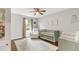 Stylish Bedroom with a crib, chair, and large window for natural light at 106 E Delafield Ave, Durham, NC 27704
