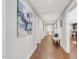 This hallway includes recessed lighting, and it provides access to the kitchen and bathroom at 106 E Delafield Ave, Durham, NC 27704