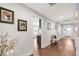 This beautiful hallway features wood floors, recessed lighting, and access to the kitchen at 106 E Delafield Ave, Durham, NC 27704
