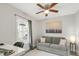 Office space with a sofa bed, a desk, and a window that offers natural light at 106 E Delafield Ave, Durham, NC 27704
