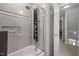 Updated bathroom showcases a luxurious shower with multiple jets and tiled walls at 107 Ashwick Ct, Cary, NC 27513