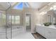 Bathroom with large soaking tub and large, double vanity at 107 Ashwick Ct, Cary, NC 27513