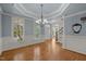 Open entryway showcases hardwood floors, staircase, and natural light at 107 Ashwick Ct, Cary, NC 27513