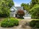 Charming home with lush landscaping, well-kept lawn, and a two-car garage at 107 Ashwick Ct, Cary, NC 27513