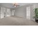 Spacious main bedroom with plush carpet and walk-in closets at 107 Ashwick Ct, Cary, NC 27513
