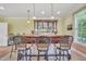 Entertain in style at this wet bar with custom cabinetry and seating at 107 Stargrass Ave, Clayton, NC 27527