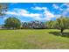 Beautiful brick home with a manicured lawn and lush landscaping at 107 Stargrass Ave, Clayton, NC 27527