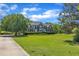 Beautiful brick home with a manicured lawn and lush landscaping at 107 Stargrass Ave, Clayton, NC 27527