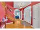 Elegant foyer with hardwood floors, staircase, and natural light at 107 Stargrass Ave, Clayton, NC 27527