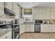Bright kitchen features stainless steel appliances, and ample countertop space at 107 Stargrass Ave, Clayton, NC 27527