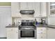 Bright kitchen features stainless steel appliances, and ample countertop space at 107 Stargrass Ave, Clayton, NC 27527