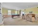 Spacious recreation room with billiard table and ample seating at 107 Stargrass Ave, Clayton, NC 27527