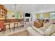 Spacious recreation room with bar, fireplace, billiard table and ample seating at 107 Stargrass Ave, Clayton, NC 27527