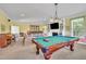Spacious recreation room with billiard table, piano and wet bar at 107 Stargrass Ave, Clayton, NC 27527
