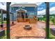 Cozy backyard with a fire pit and screened porch at 108 Wilson Farm Ln, Clayton, NC 27527