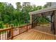 This backyard boasts a spacious wood deck and a screened porch, ideal for outdoor living at 108 Wilson Farm Ln, Clayton, NC 27527