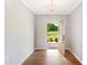 Bright entryway with hardwood floors and a view of the front yard at 108 Wilson Farm Ln, Clayton, NC 27527