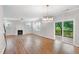 Living room featuring fireplace and sliding glass doors to porch at 108 Wilson Farm Ln, Clayton, NC 27527