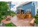 Outdoor patio with fire pit, deck, and pergola great for entertaining at 108 Wilson Farm Ln, Clayton, NC 27527