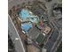 Aerial view of the Amberly community, highlighting the swimming pool, clubhouse, tennis courts, and playground at 109 Longchamp Ln, Cary, NC 27519