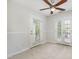 Bedroom with carpet, ceiling fan and balcony doors at 109 Longchamp Ln, Cary, NC 27519