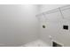 Laundry room with shelving and hookups ready for washer and dryer at 109 Longchamp Ln, Cary, NC 27519