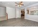 Inviting living room featuring sleek flooring, neutral walls, and abundant natural light at 109 Longchamp Ln, Cary, NC 27519