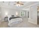 Spacious main bedroom with tray ceilings, columns and a serene, light-filled atmosphere at 109 Longchamp Ln, Cary, NC 27519
