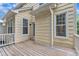 Inviting wooden deck with white railing on back of the house at 11012 Southwalk Ln, Raleigh, NC 27614