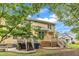 Backyard view with a wooden deck and lush green surroundings at 11012 Southwalk Ln, Raleigh, NC 27614