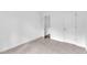 Carpeted bedroom with white walls and doors at 11012 Southwalk Ln, Raleigh, NC 27614