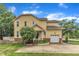 Charming exterior showcasing a manicured lawn, driveway, and a one-car garage at 11012 Southwalk Ln, Raleigh, NC 27614